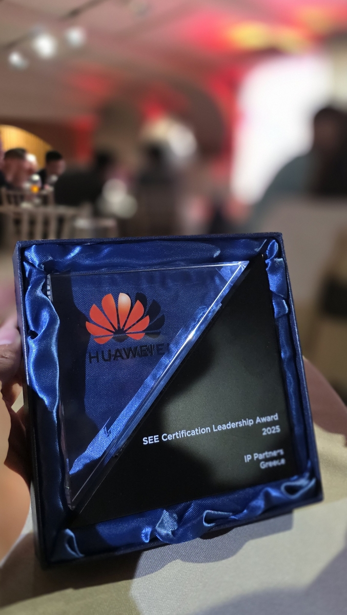 Close-up of the 2025 SEE Certification Leadership Award trophy in its presentation box, engraved with the Huawei logo and "IP Partners – Greece."