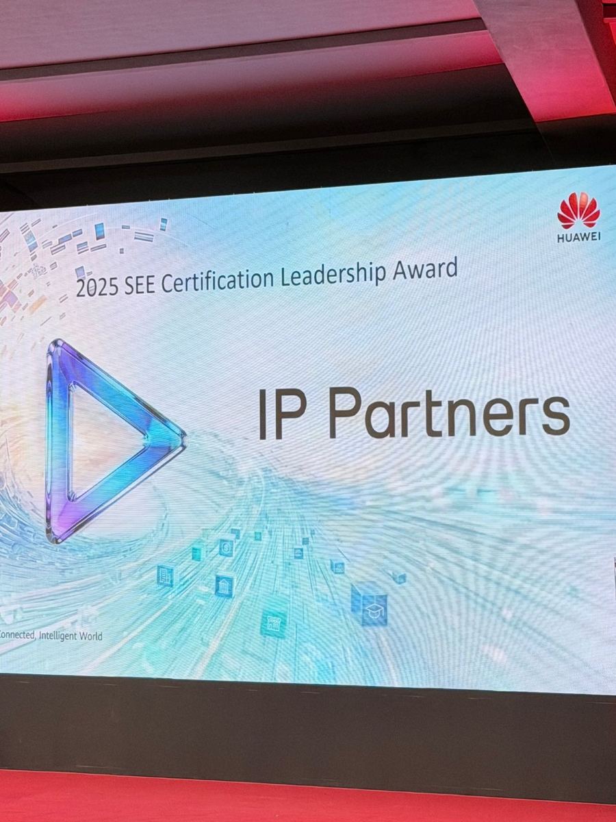 Stage screen at the Huawei South East European Partner Summit 2026 announcing IP Partners as the recipient of the 2025 SEE Certification Leadership Award.